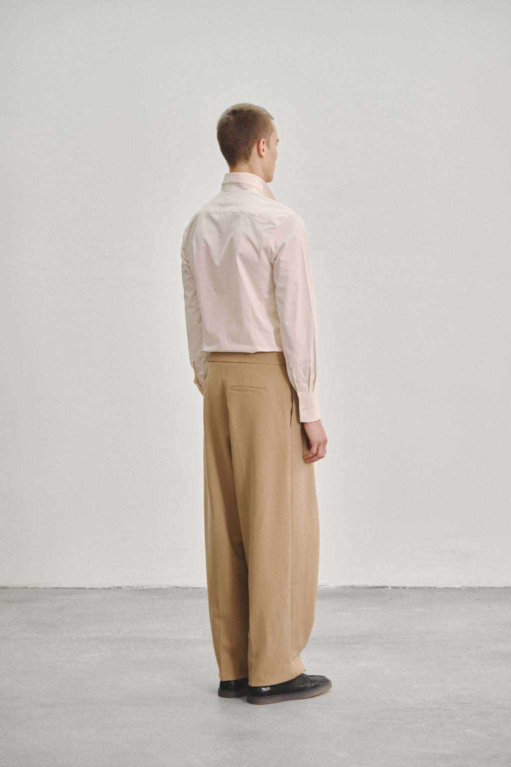 Brown 'Wrap' Pleated Trousers with Adjustable Belt Buckle in Stretch Tencel Crepe