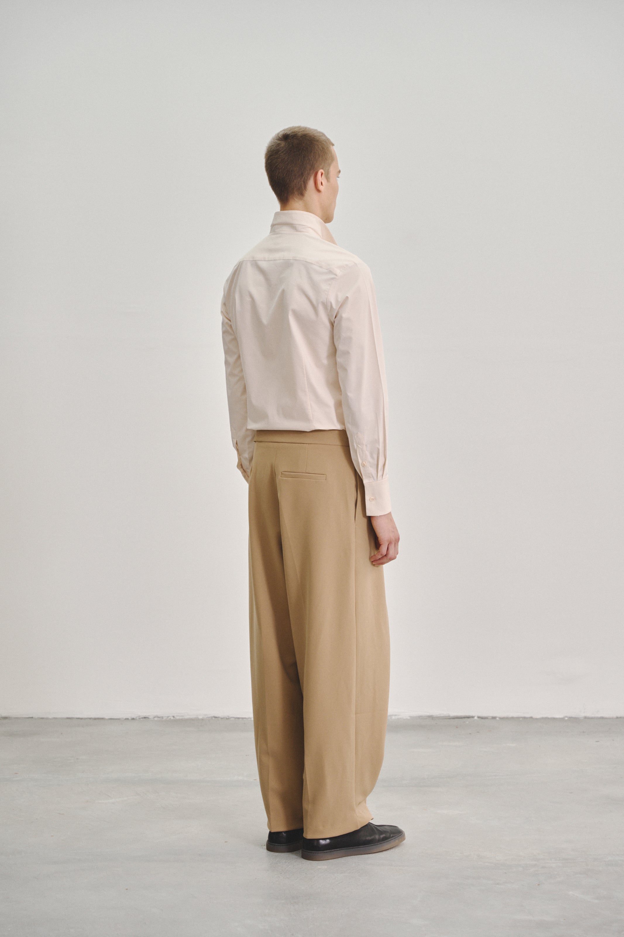 Brown 'Wrap' Pleated Trousers with Adjustable Belt Buckle in Stretch Tencel Crepe