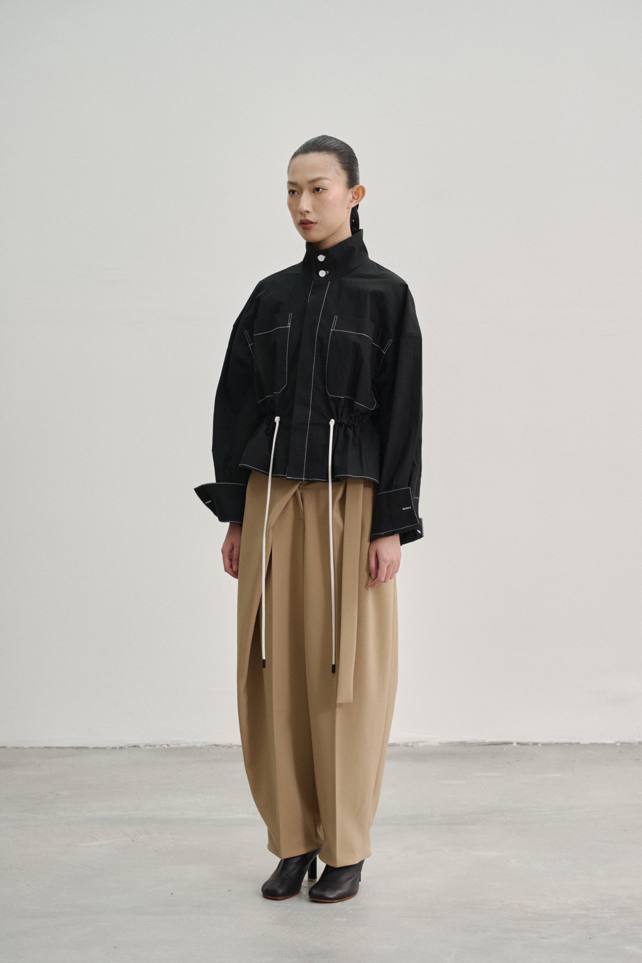 Brown 'Wrap' Pleated Trousers with Adjustable Belt Buckle in Stretch Tencel Crepe